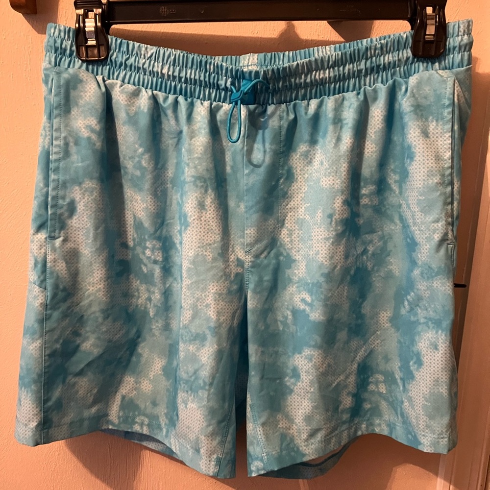 All in Motion turquoise shorts. Elastic waistband w/ continuous loop drawstring.